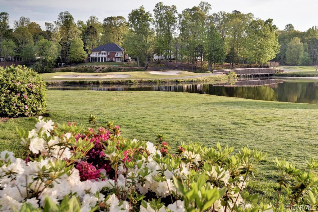 103 Gullane Williamsburg, VA 23188 - Photo 41 of 44 a view of a swimming pool with an outdoor space and seating area