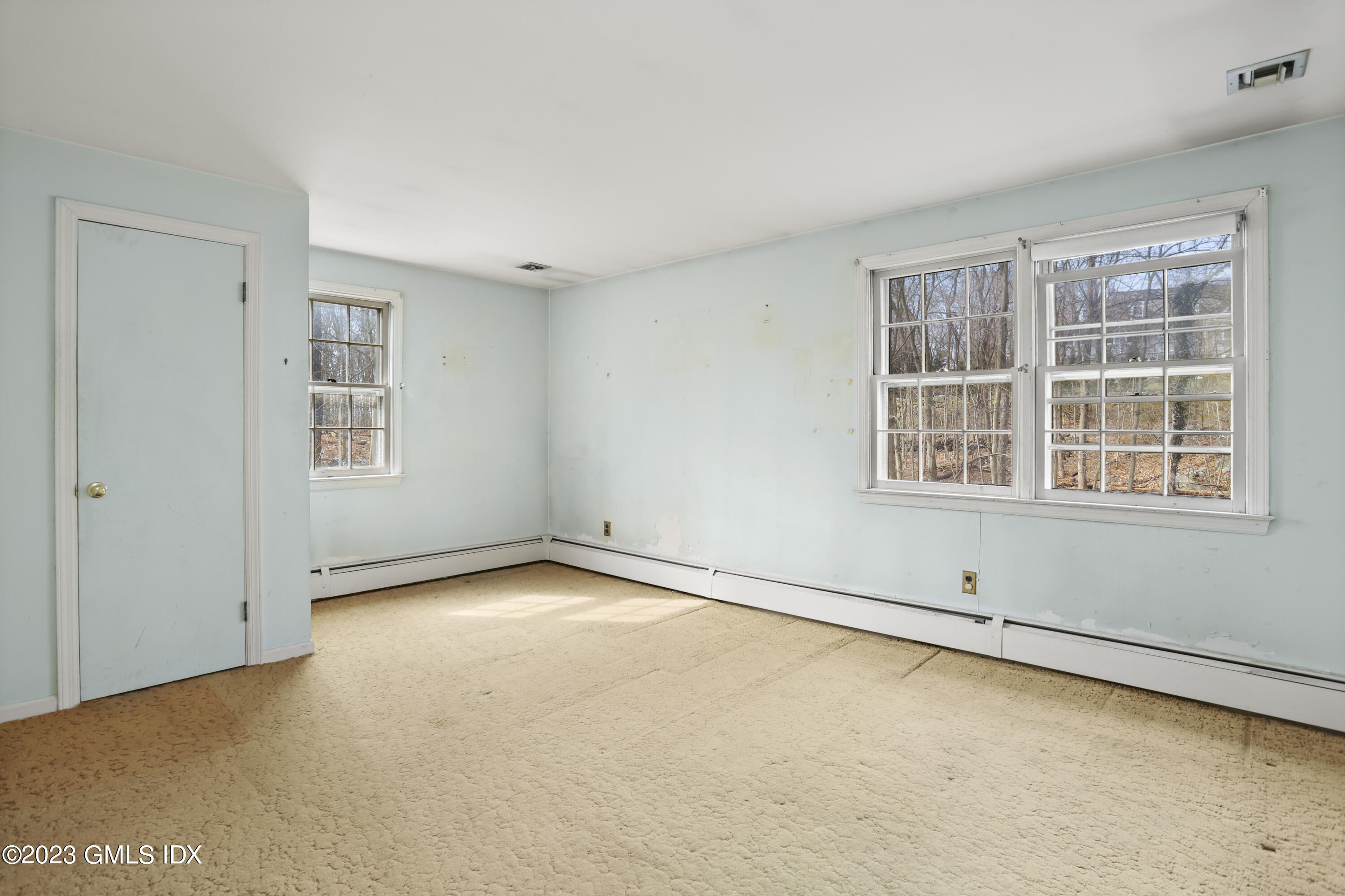 46 Dandy Drive Cos Cob, CT 06807 - Photo 17 of 26 a view of an empty room with a window