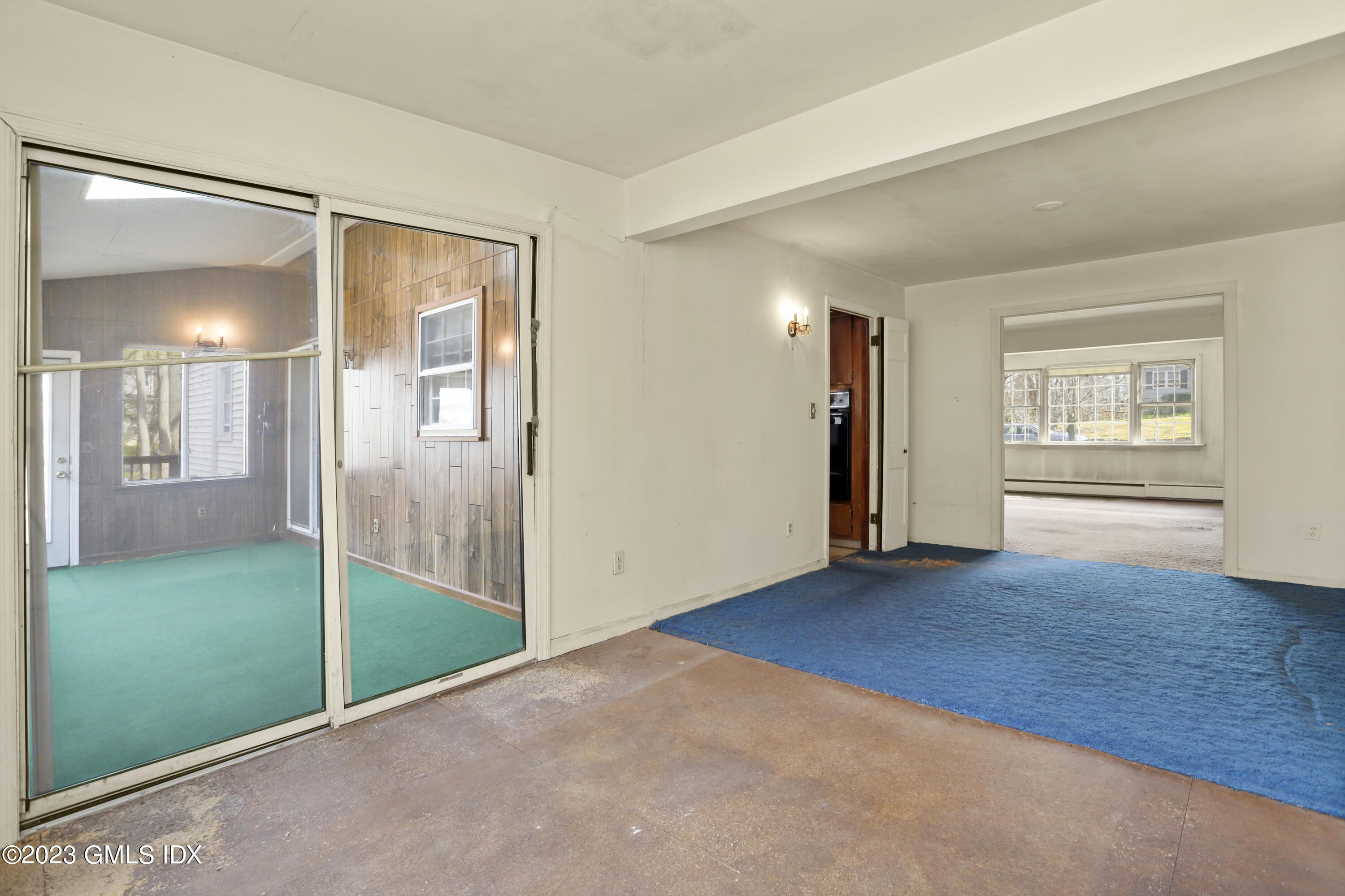 46 Dandy Drive Cos Cob, CT 06807 - Photo 20 of 26 wooden floor in an empty room with a window