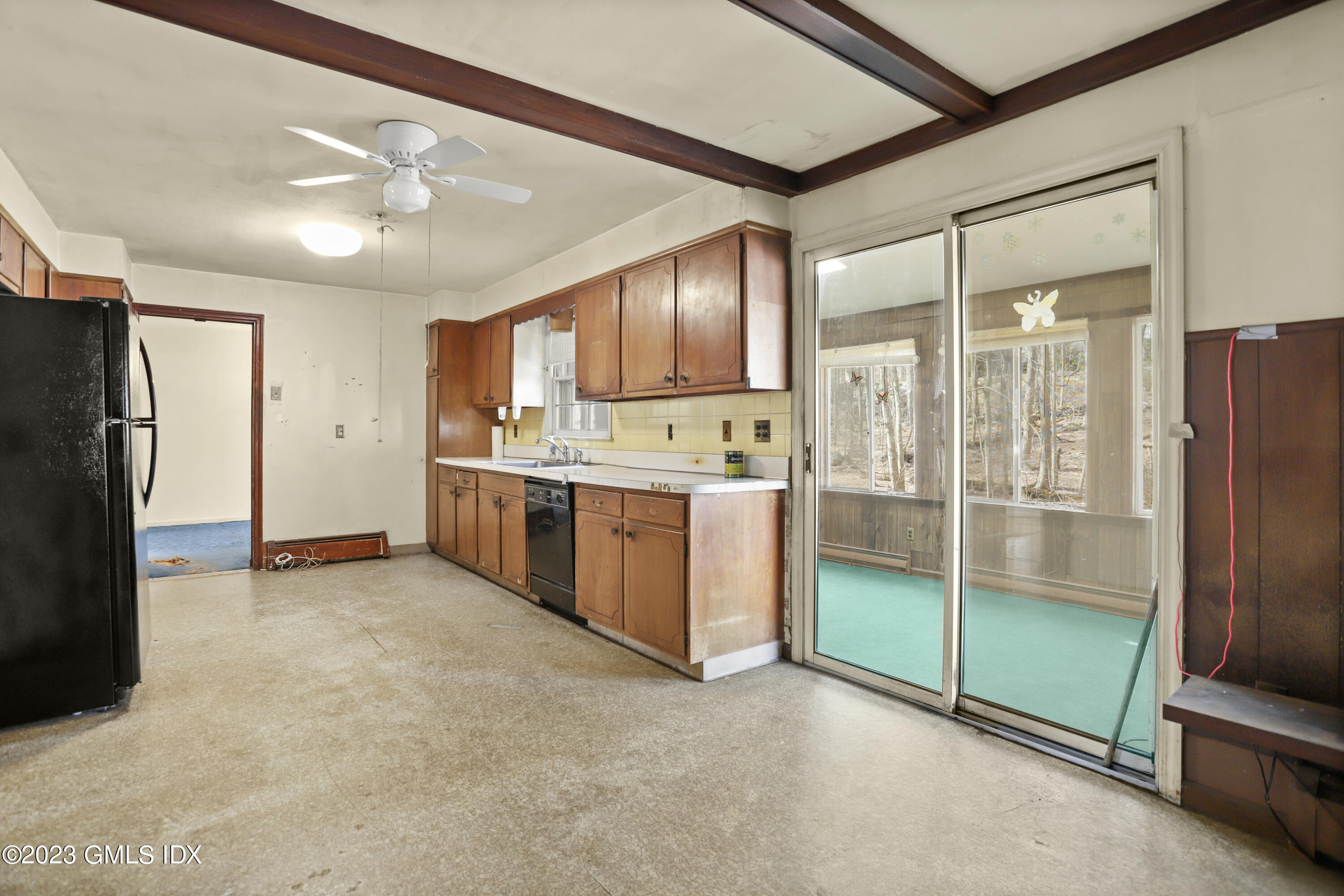 46 Dandy Drive Cos Cob, CT 06807 - Photo 21 of 26 a kitchen with stainless steel appliances granite countertop a refrigerator and a sink