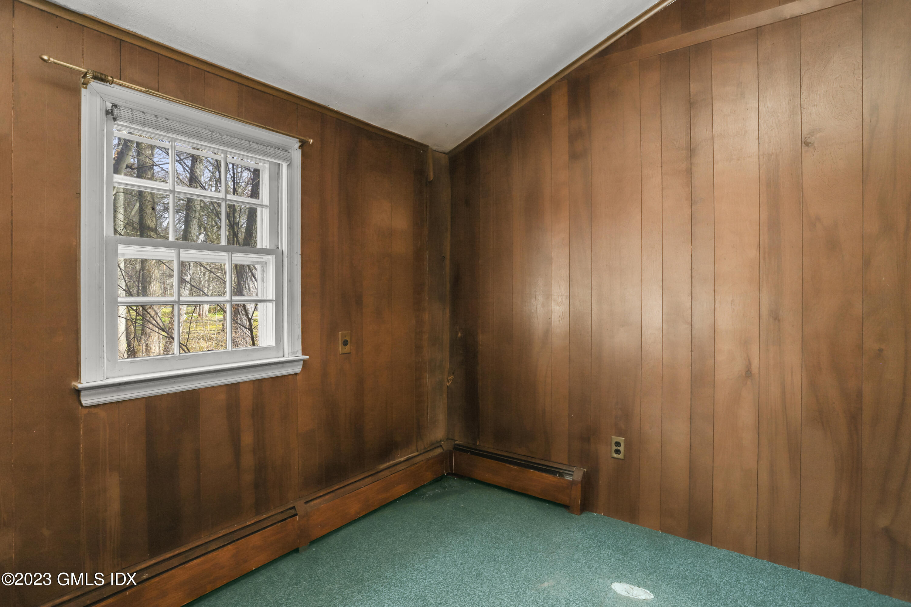 46 Dandy Drive Cos Cob, CT 06807 - Photo 25 of 26 an empty room with windows