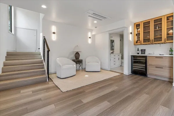 a bathroom with vanity sink and a mirror