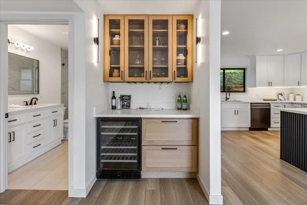 a bedroom with a large bed and a large window