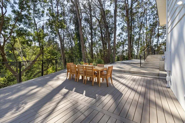 a view of a yard with a tree