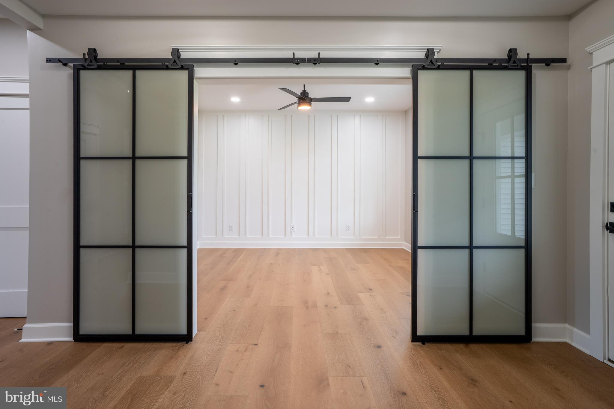 22430 Hummingbird Road Ellendale, DE 19941 - Photo 18 of 39 a view of a walk in closet