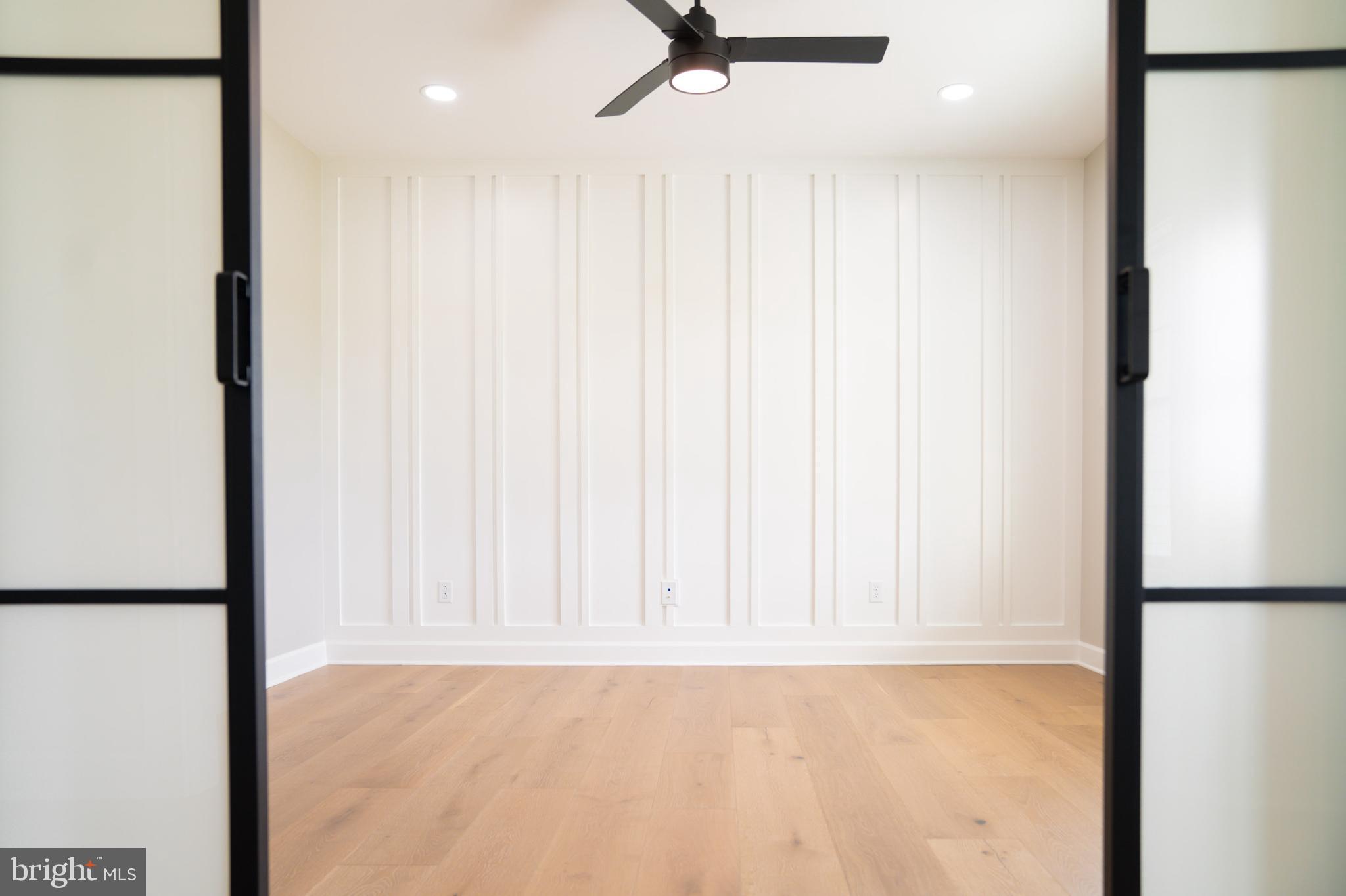 22430 Hummingbird Road Ellendale, DE 19941 - Photo 19 of 39 a view of a livingroom with a ceiling fan