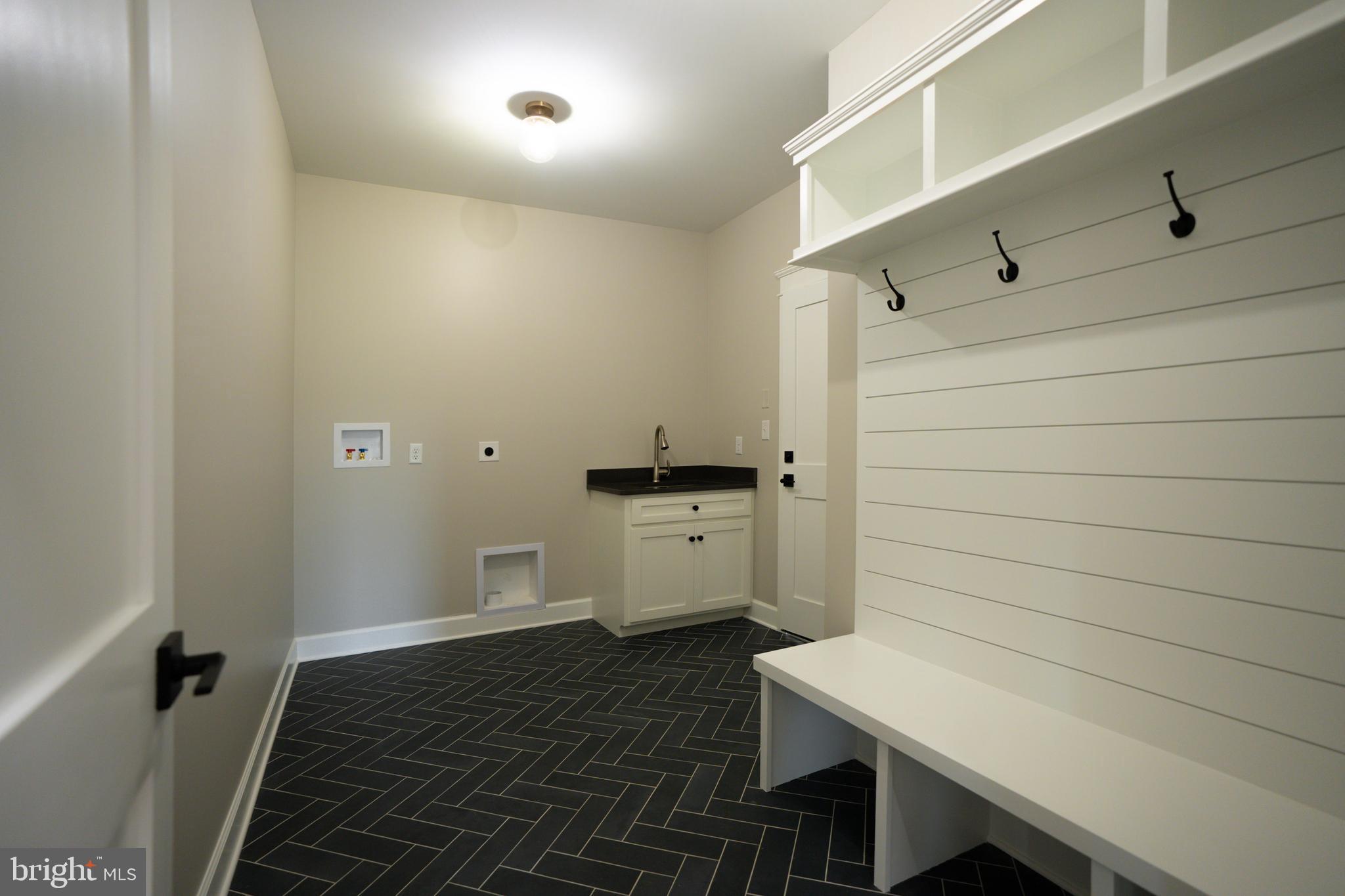 22430 Hummingbird Road Ellendale, DE 19941 - Photo 31 of 39 a bathroom with a sink a toilet and shower