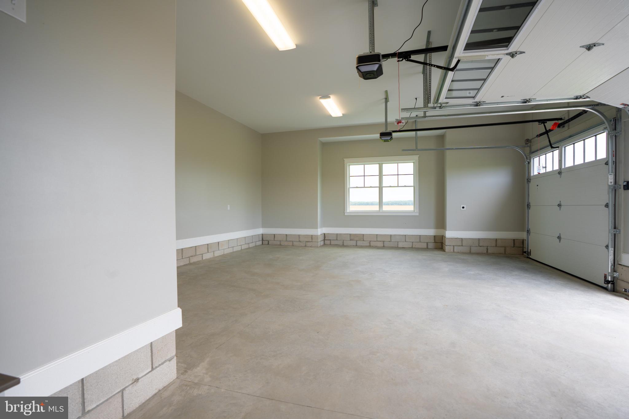 22430 Hummingbird Road Ellendale, DE 19941 - Photo 33 of 39 a view of a livingroom with a fireplace