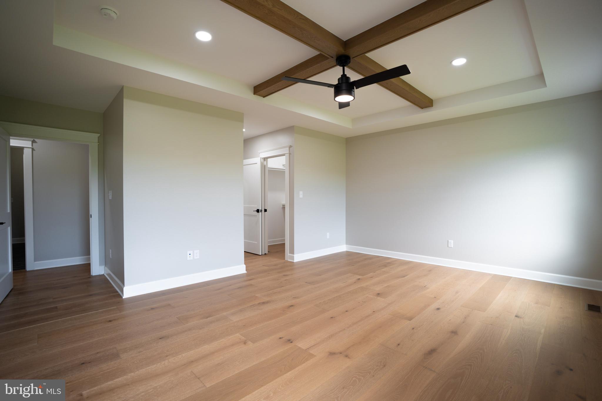 22430 Hummingbird Road Ellendale, DE 19941 - Photo 10 of 39 a view of empty room with wooden floor