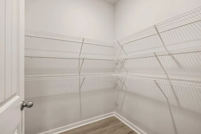 a view of a room with racks on the wall