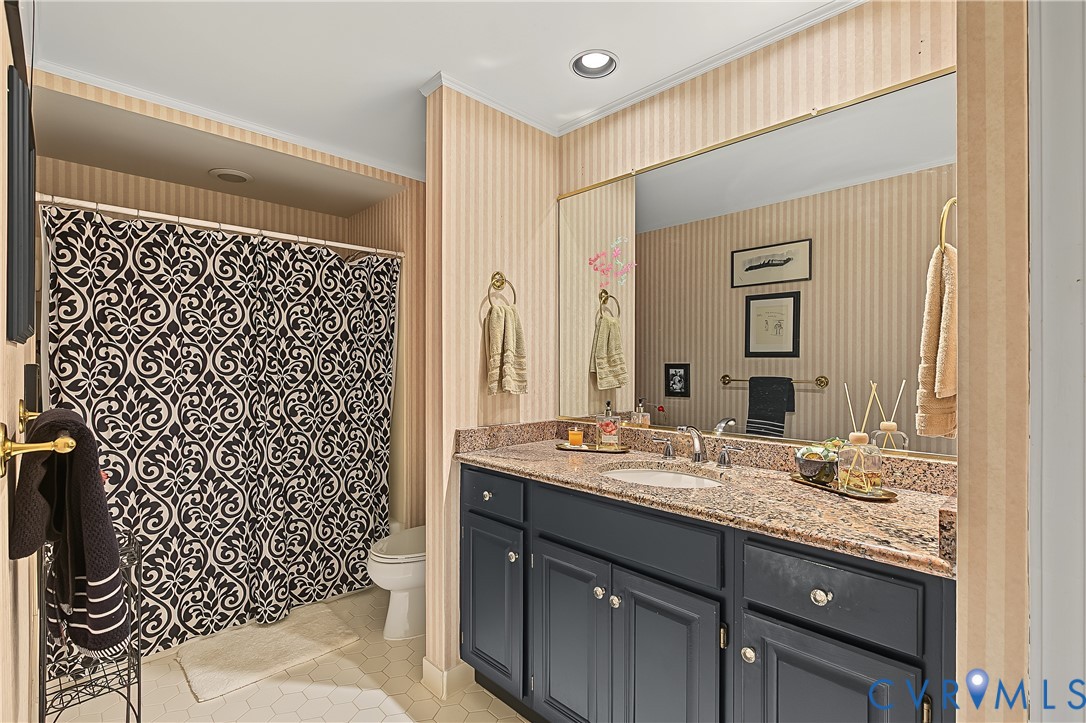 3131 Stony Point Road, Unit B Richmond, VA 23235 - Photo 41 of 65 Vanity with an integrated sink, stone countertop,