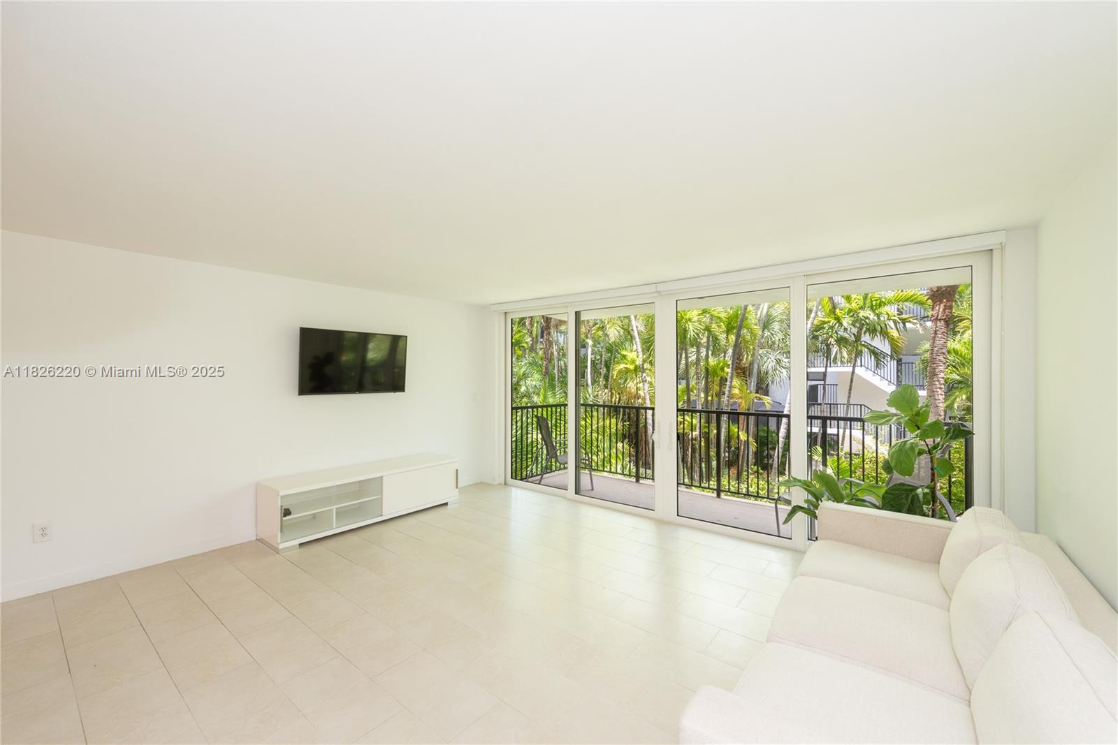 101 Ocean Ln Drive, Unit 2017 Key Biscayne, FL 33149 - Photo 22 of 25 a view of a livingroom with a flat screen tv