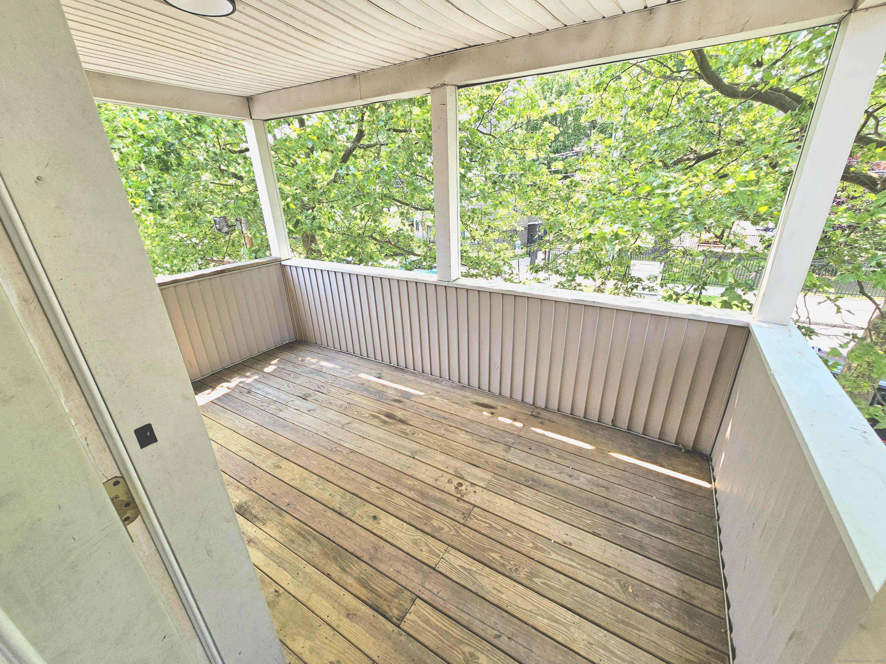 483 Ferry Street, Unit 2 New Haven, CT 06513 - Photo 2 of 11 a view of balcony with wooden floor