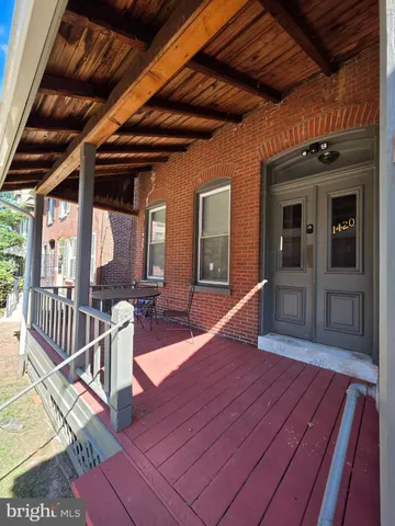 a outdoor space with wooden seating