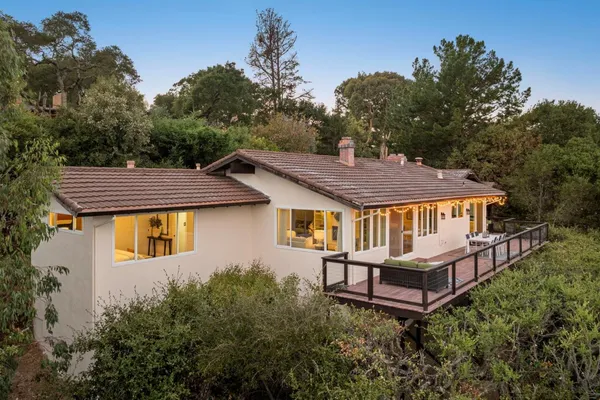 a house view with a garden space