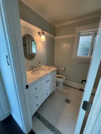 a view of balcony with chairs and wooden floor