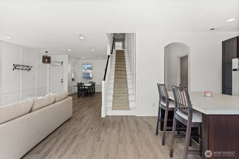 a kitchen with a sink cabinets and stainless steel appliances