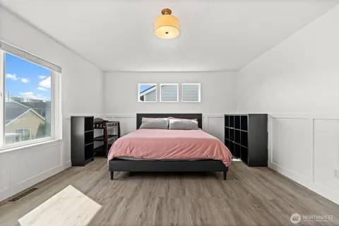 a bathroom with a bathtub and a toilet