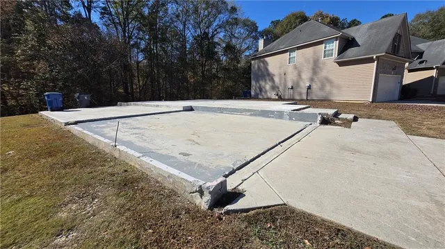 a view of a terrace with wooden fence