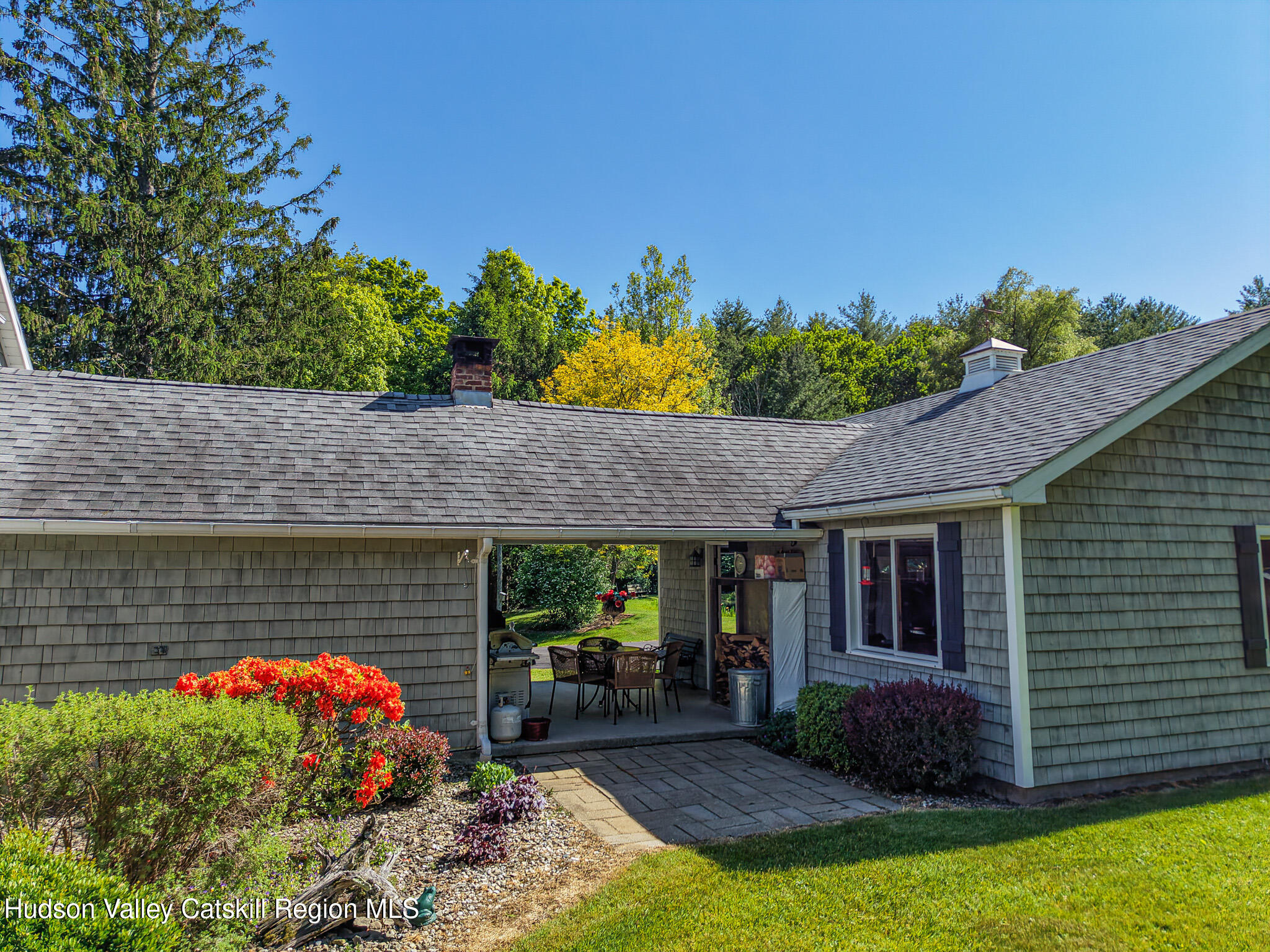 221 Camp Medusa Road Rensselaerville, NY 12120 - Photo 51 of 57 a front view of a house with garden