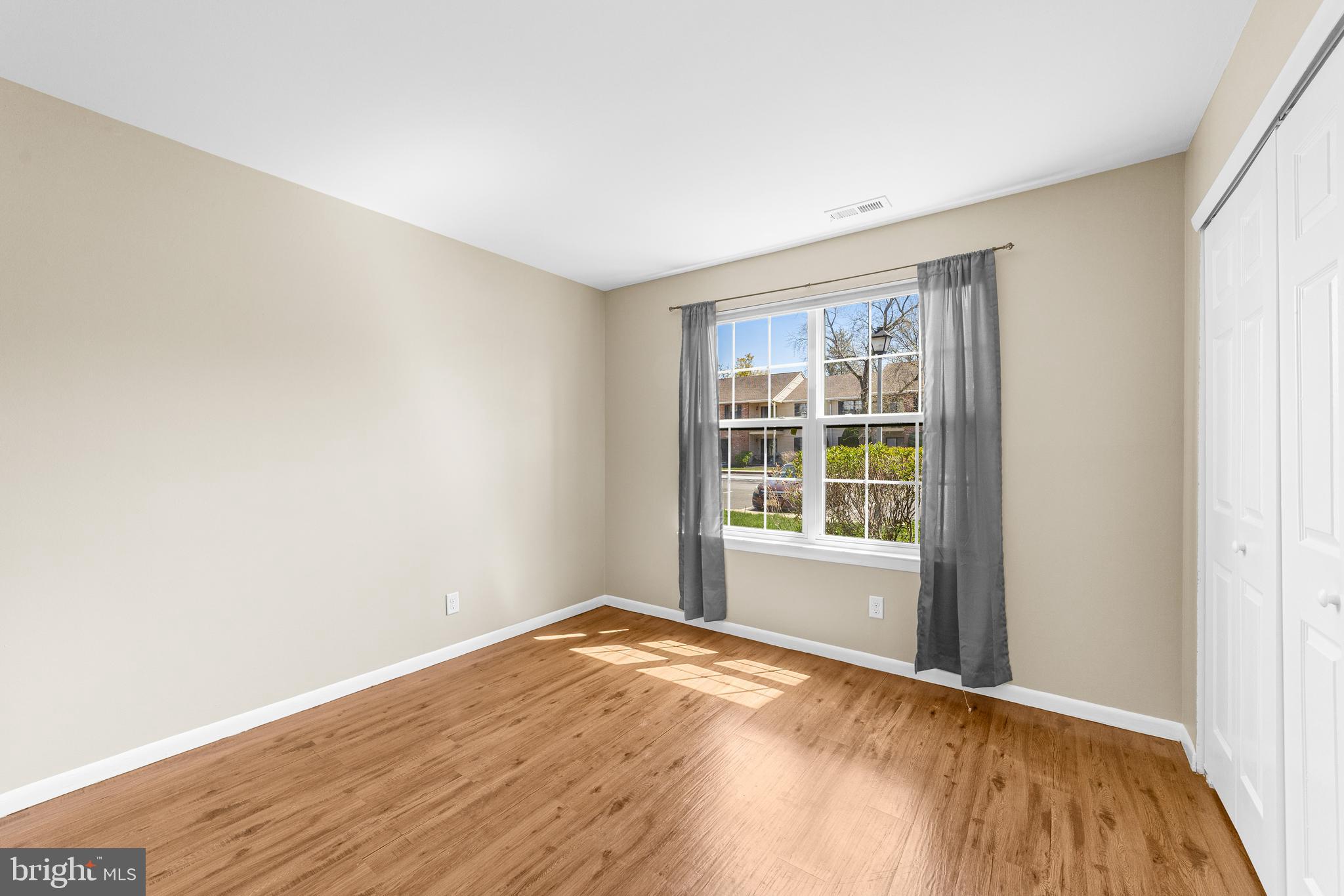 536 A Willow Turn Mount Laurel, NJ 08054 - Photo 12 of 20 a view of empty room with wooden floor and fan