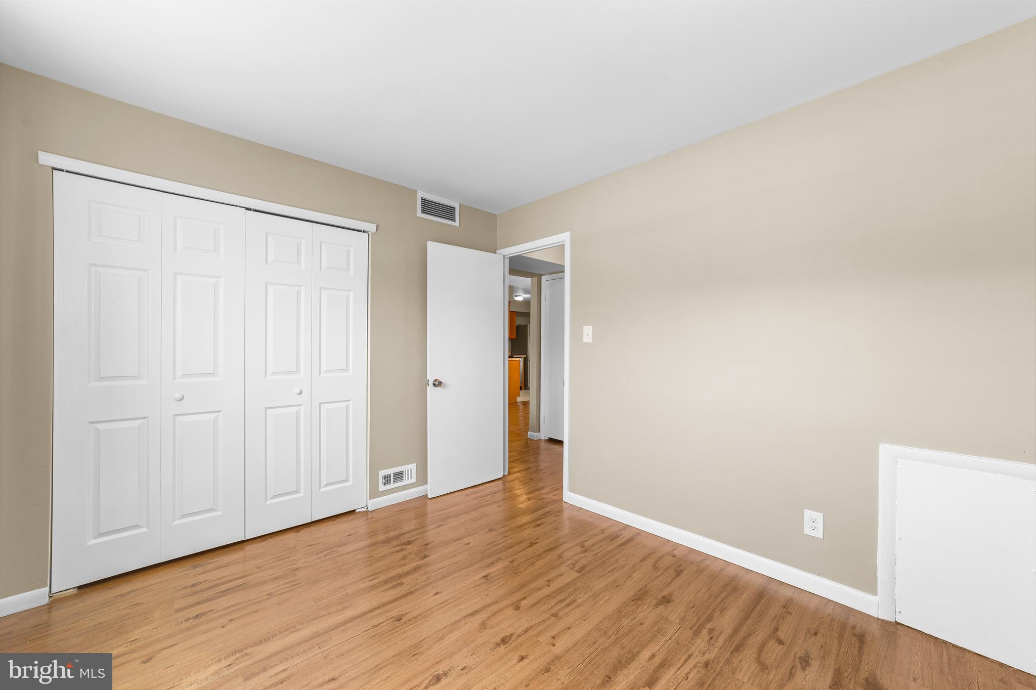 536 A Willow Turn Mount Laurel, NJ 08054 - Photo 13 of 20 a view of an empty room with wooden floor