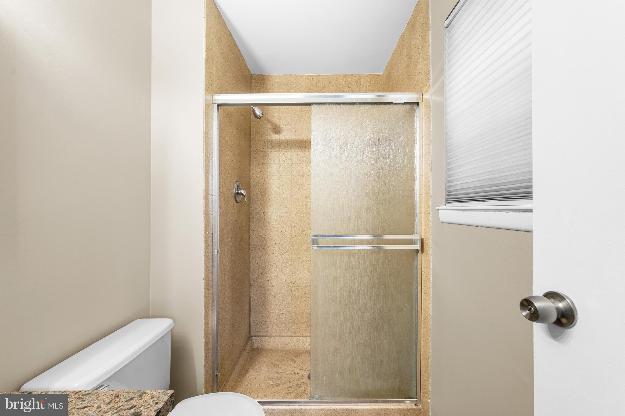 536 A Willow Turn Mount Laurel, NJ 08054 - Photo 20 of 20 a bathroom with a glass shower door