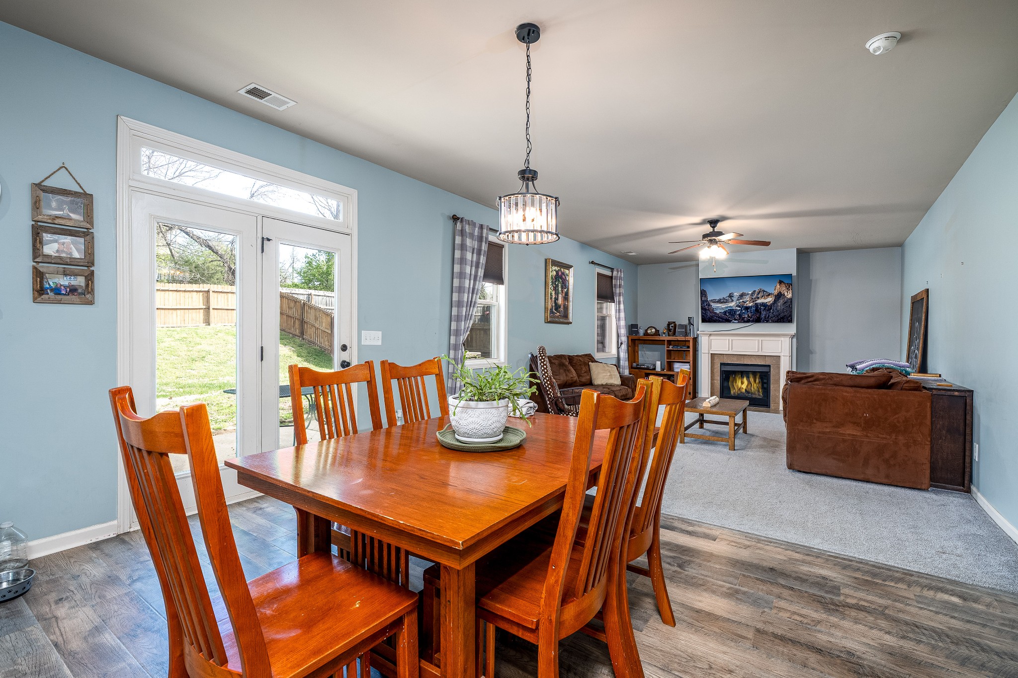 2034 Austin Drive Spring Hill, TN 37174 - Photo 12 of 41 a view of a dining room with furniture window and wooden floor