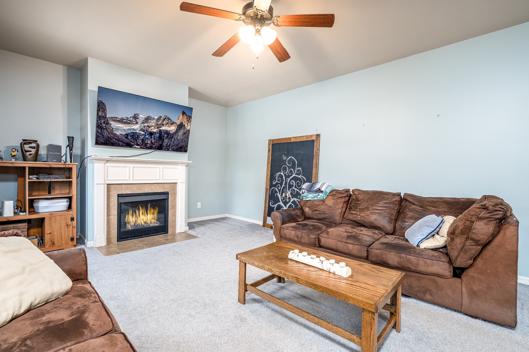 2034 Austin Drive Spring Hill, TN 37174 - Photo 15 of 41 a living room with furniture and a fireplace