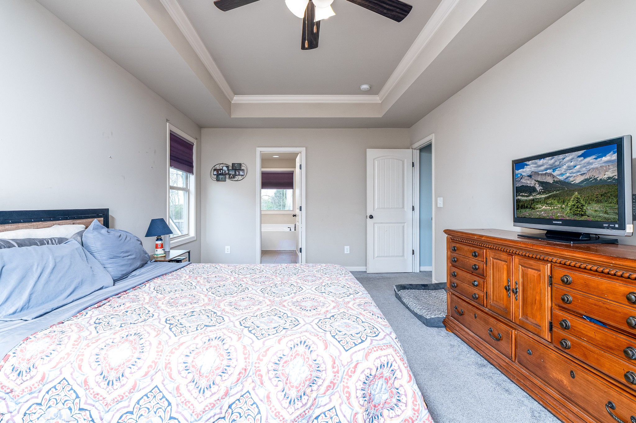 2034 Austin Drive Spring Hill, TN 37174 - Photo 18 of 41 a bedroom with furniture and a flat screen tv