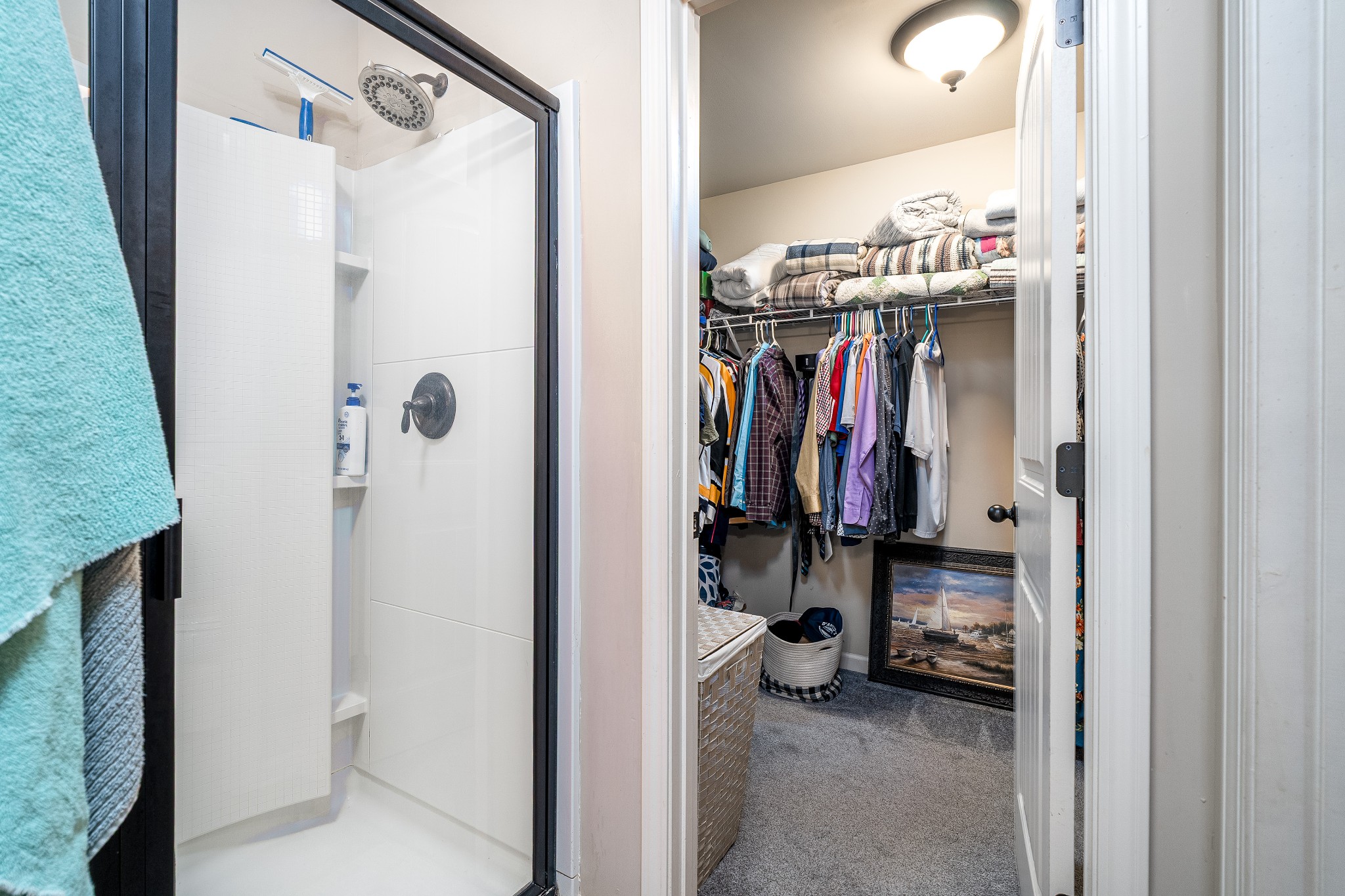 2034 Austin Drive Spring Hill, TN 37174 - Photo 22 of 41 a view of walk in closet with clothes and shoes