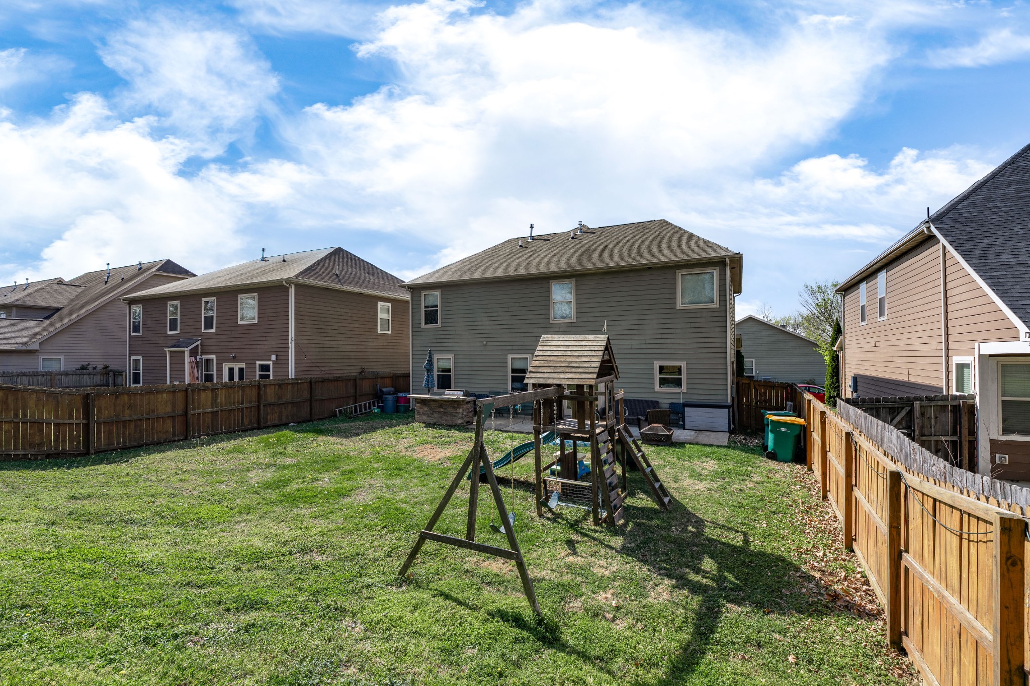 2034 Austin Drive Spring Hill, TN 37174 - Photo 31 of 41 a view of a house with a yard and sitting area
