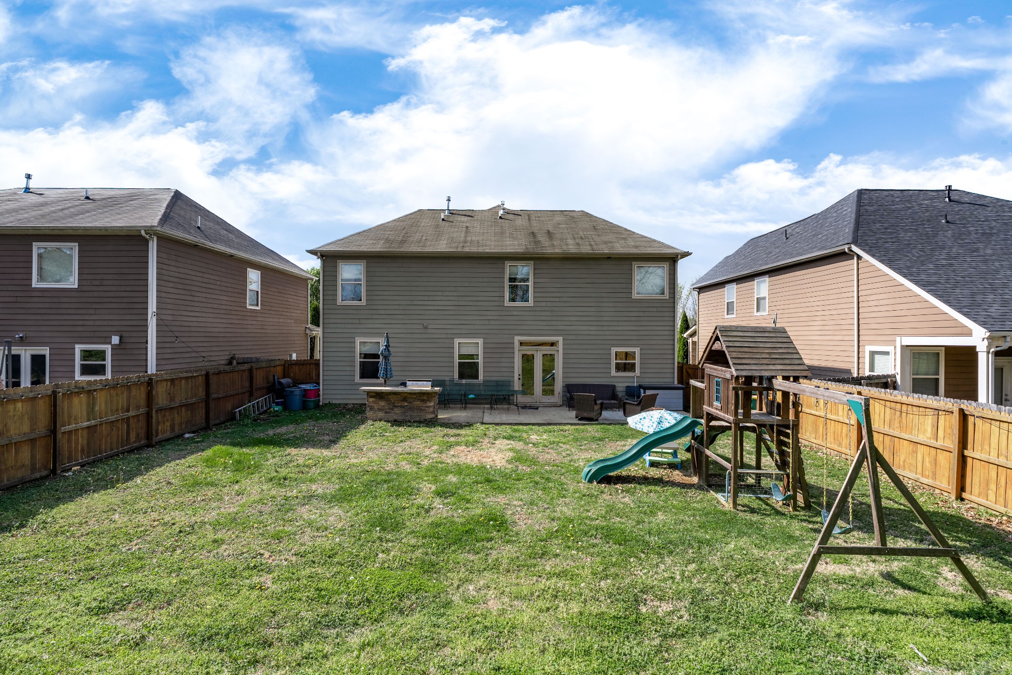 2034 Austin Drive Spring Hill, TN 37174 - Photo 32 of 41 a view of a house with backyard and sitting area