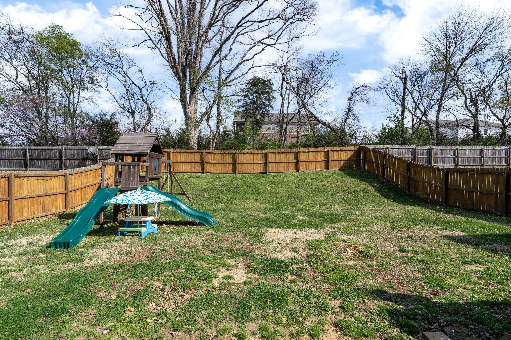 2034 Austin Drive Spring Hill, TN 37174 - Photo 34 of 41 a small garden with trees in the background