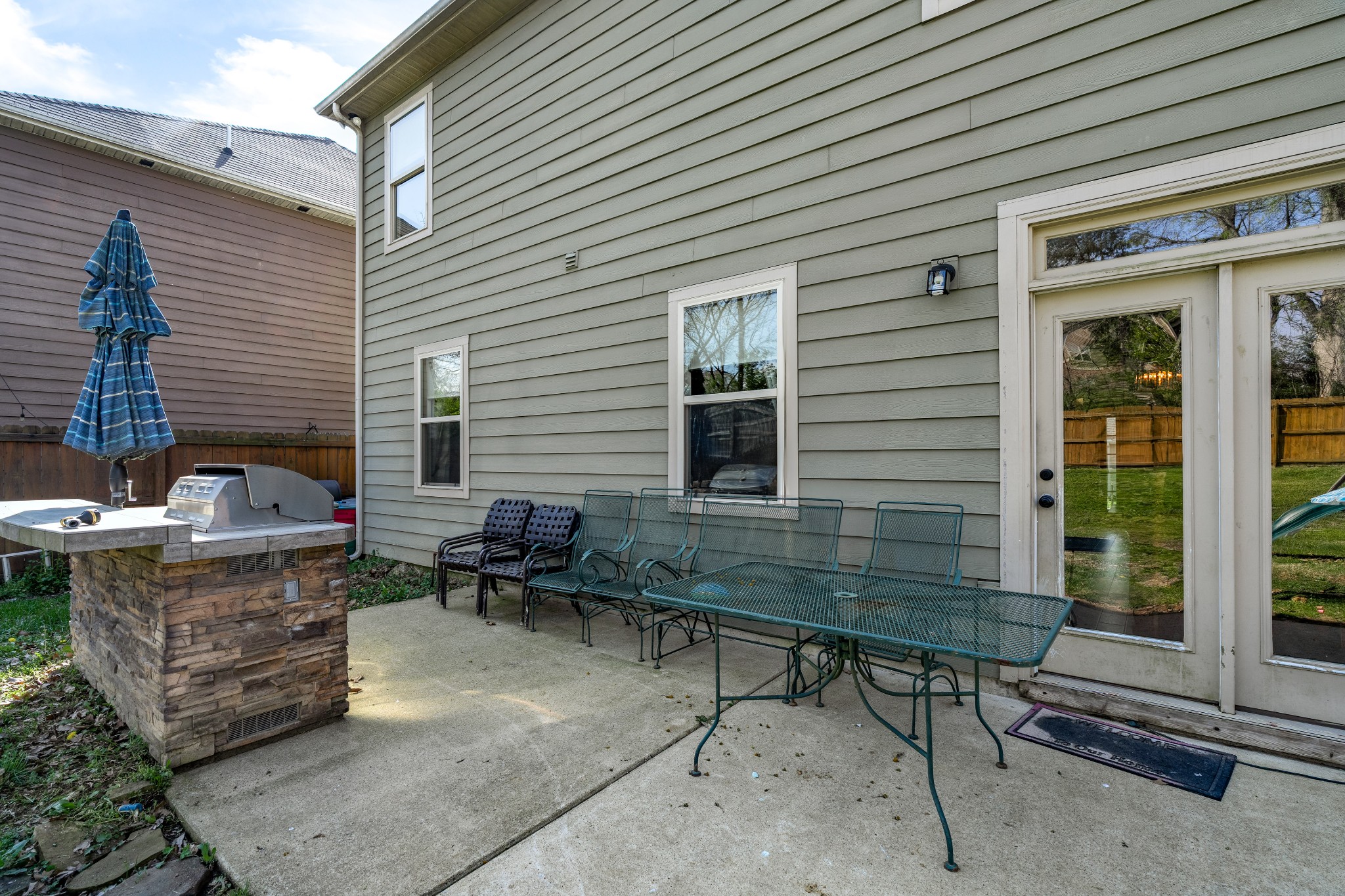 2034 Austin Drive Spring Hill, TN 37174 - Photo 36 of 41 a backyard of a house with outdoor seating