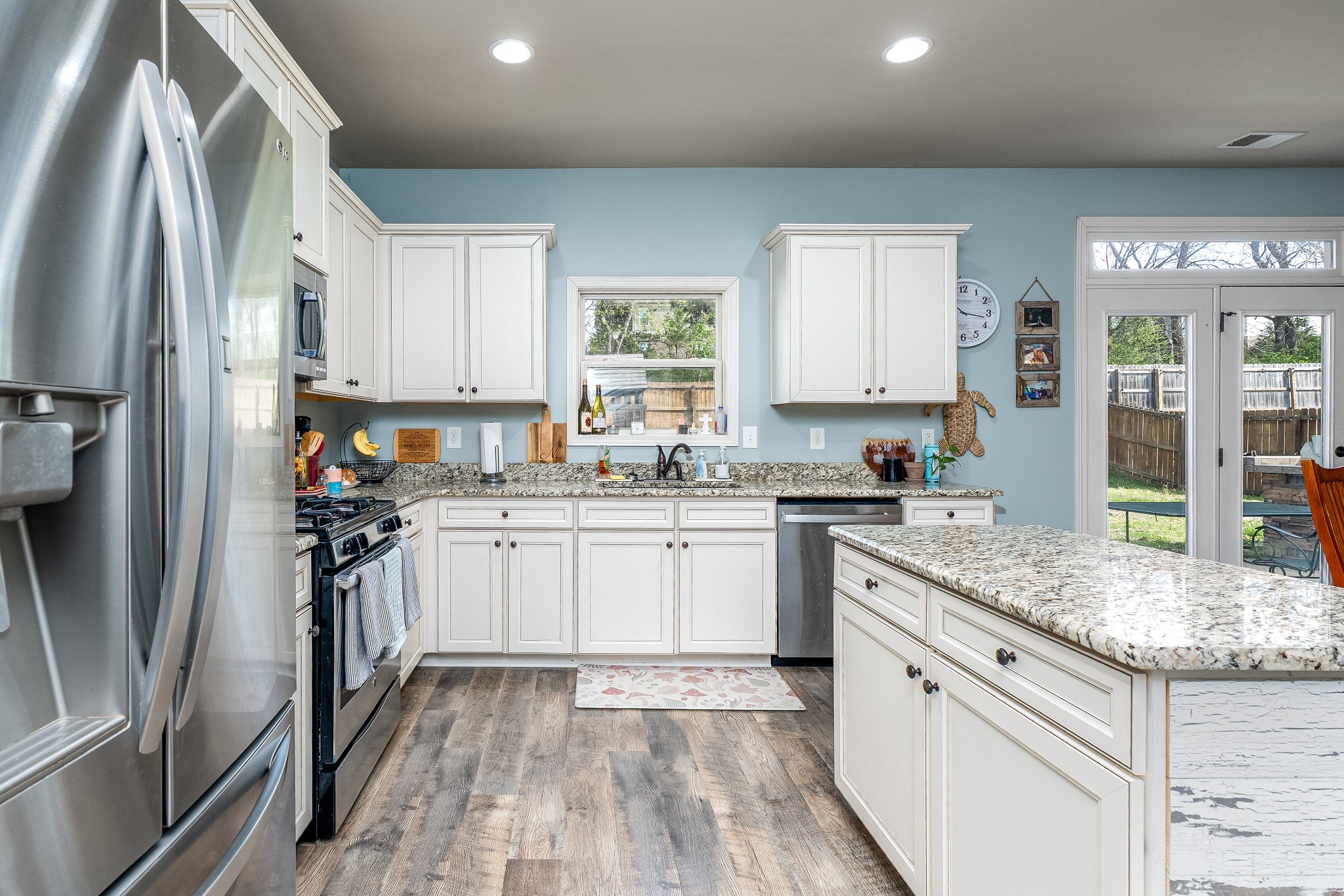 2034 Austin Drive Spring Hill, TN 37174 - Photo 10 of 41 a kitchen with a sink stove and refrigerator