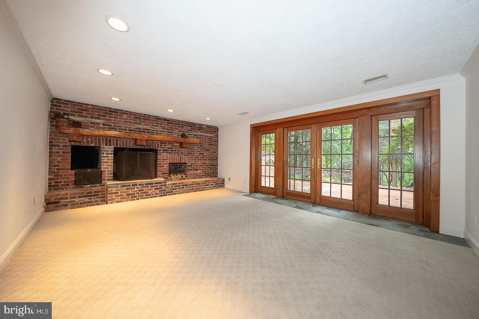 577 Tory Hill Road Devon, PA 19333 - Photo 48 of 63 Rec Room with French Doors to Outside Brick Patio