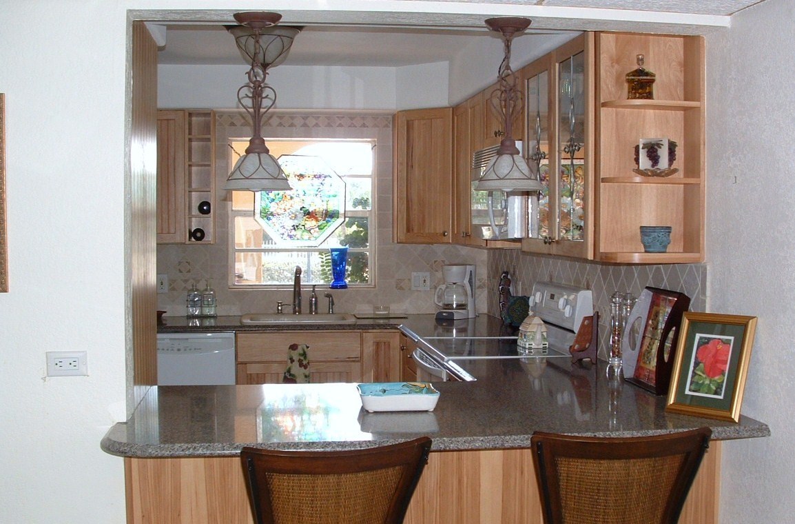 423 Sombrero Beach Road, Unit 6 Marathon, FL 33050 - Photo 6 of 23 kitchen with pass thu`