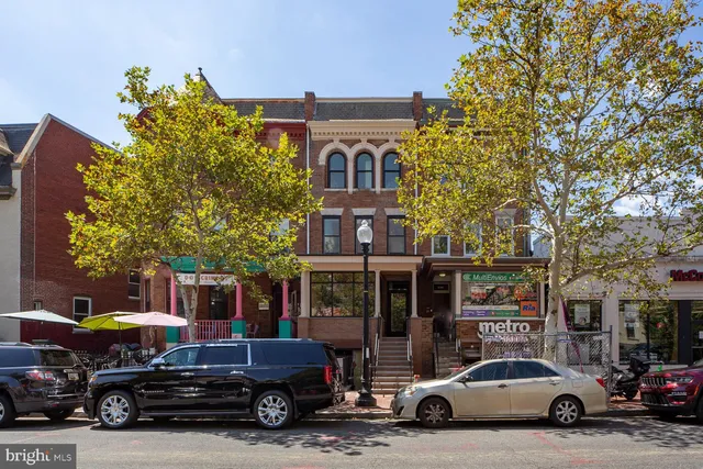 a car parked in front of a building