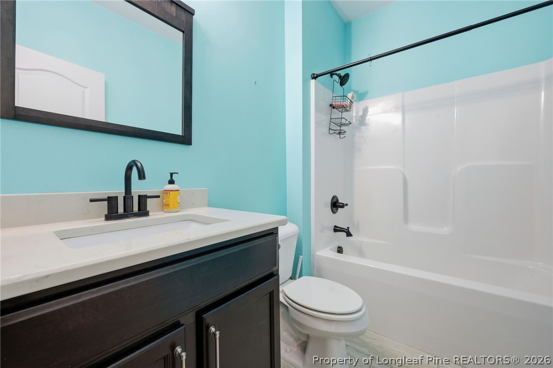 33 Colonist Place Cameron, NC 28326 - Photo 31 of 47 a bathroom with a sink a toilet and a bathtub