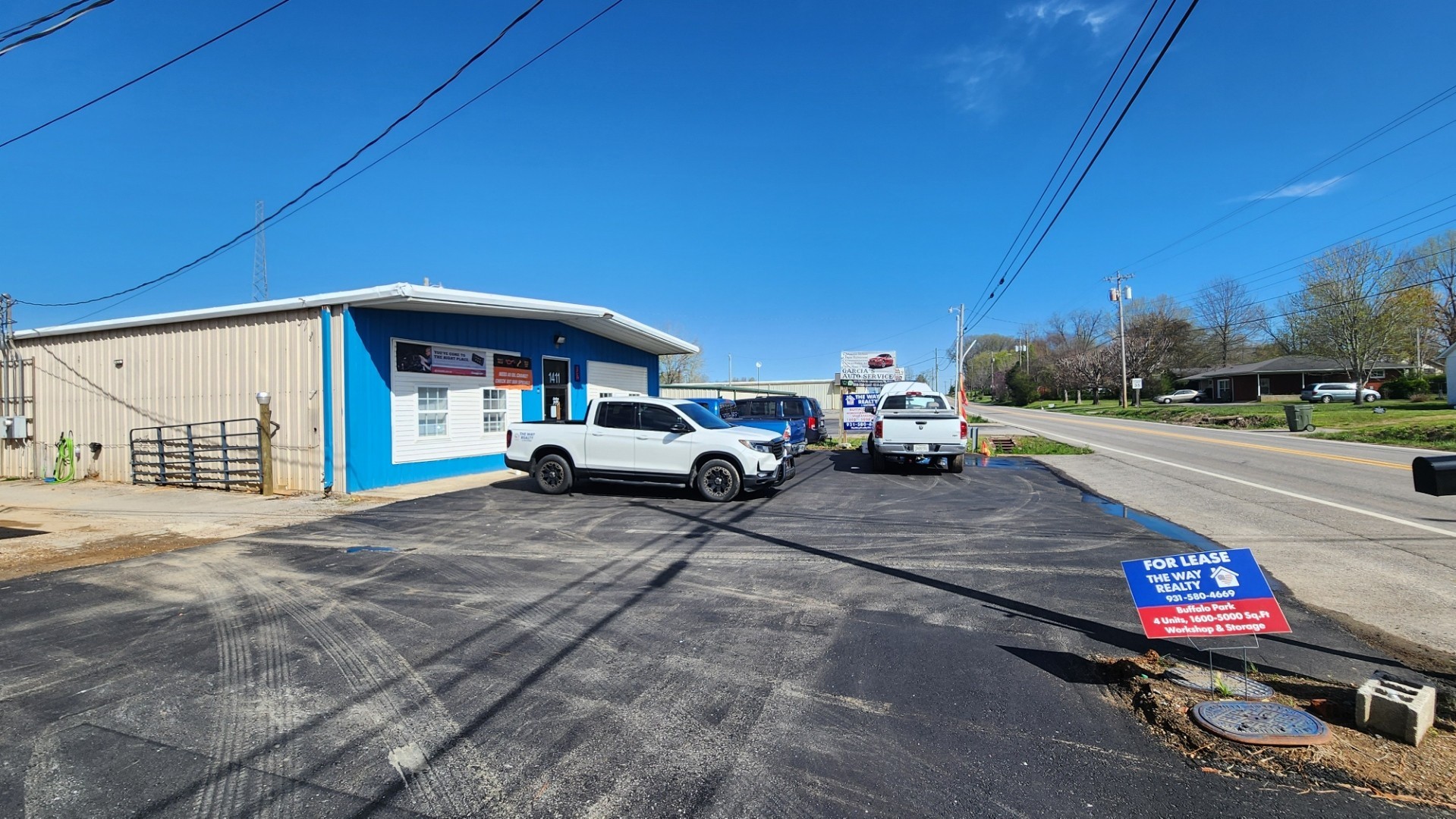 1409 Buffalo Road Lawrenceburg, TN 38464 - Photo 2 of 37 a view of street with parked cars