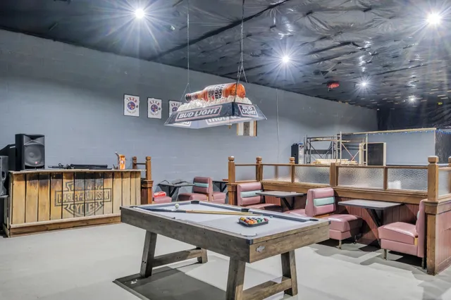 a view of a room with furniture