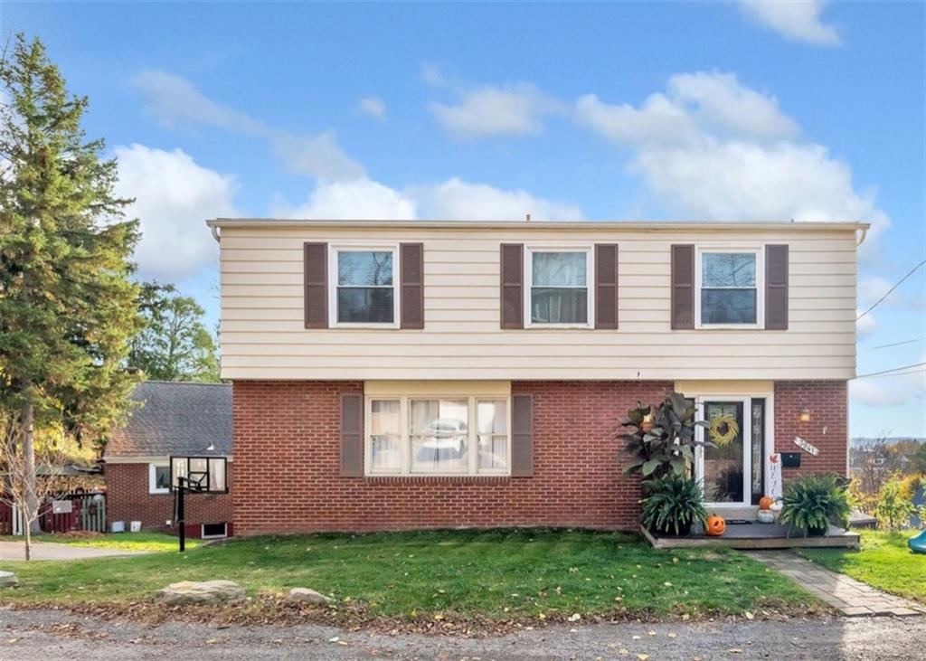 front view of house with a yard