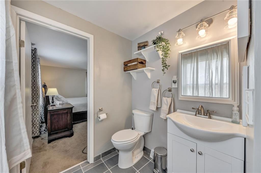 3941 Drexel Road Pittsburgh, PA 15212 - Photo 16 of 25 a bathroom with a sink toilet and shower