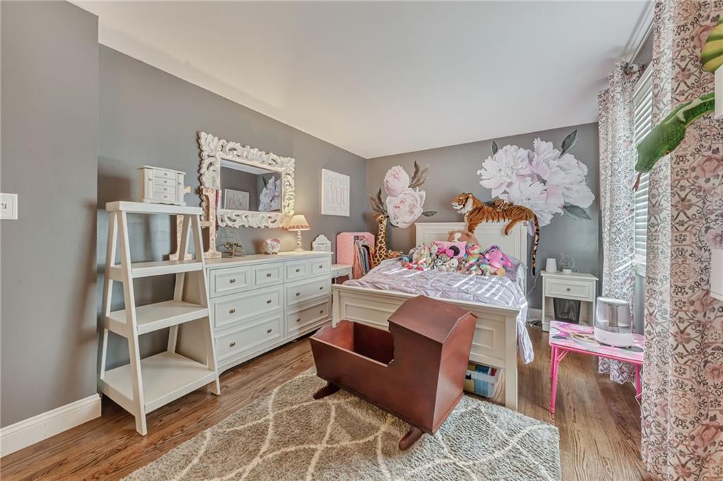 3941 Drexel Road Pittsburgh, PA 15212 - Photo 17 of 25 a bedroom with a bed and a window