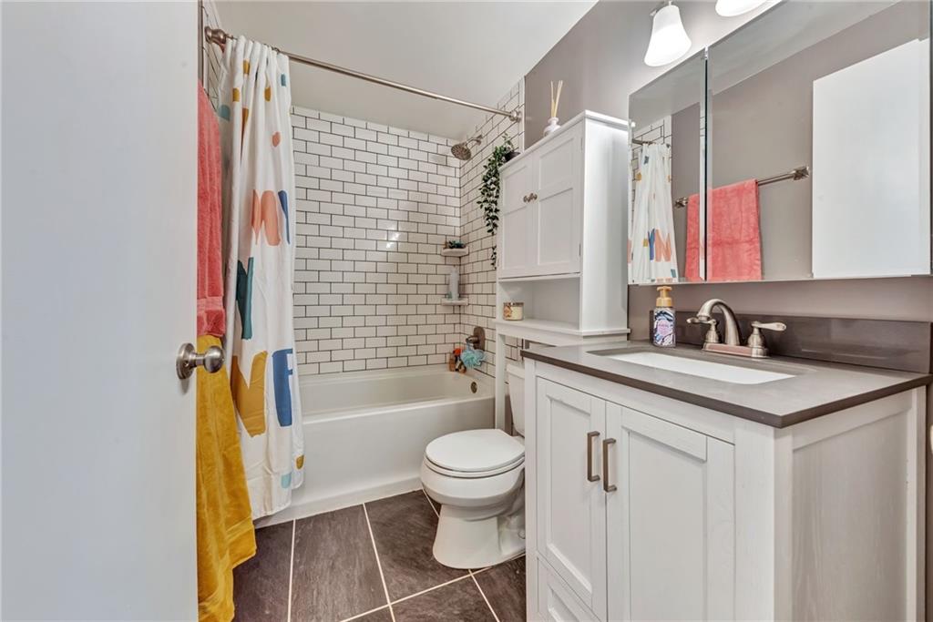 3941 Drexel Road Pittsburgh, PA 15212 - Photo 20 of 25 a bathroom with a sink a toilet and shower