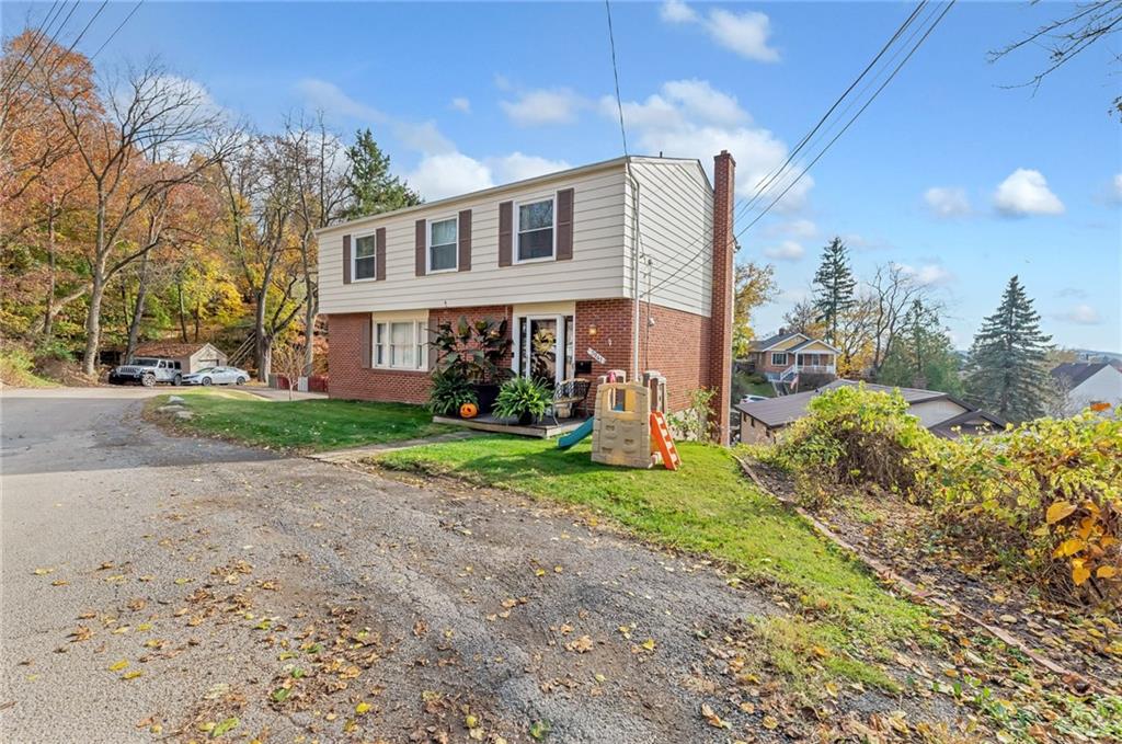 3941 Drexel Road Pittsburgh, PA 15212 - Photo 24 of 25 a front view of a house with garden