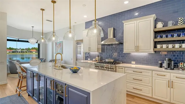 a view of walk in closet with clothes