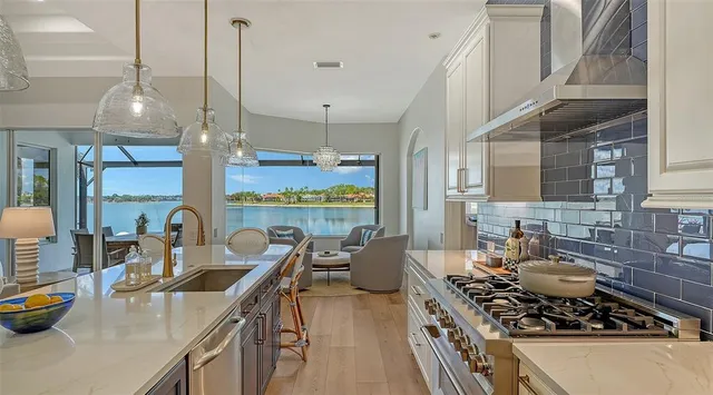 a bedroom with a bed a mirror and a window