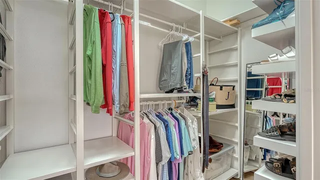 a view of a swimming pool with a lounge chairs